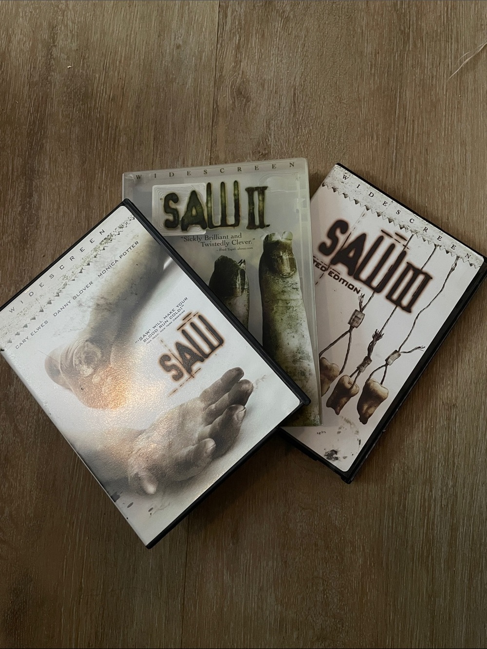 Saw DVD Bundle - White, Brown, Black Covers